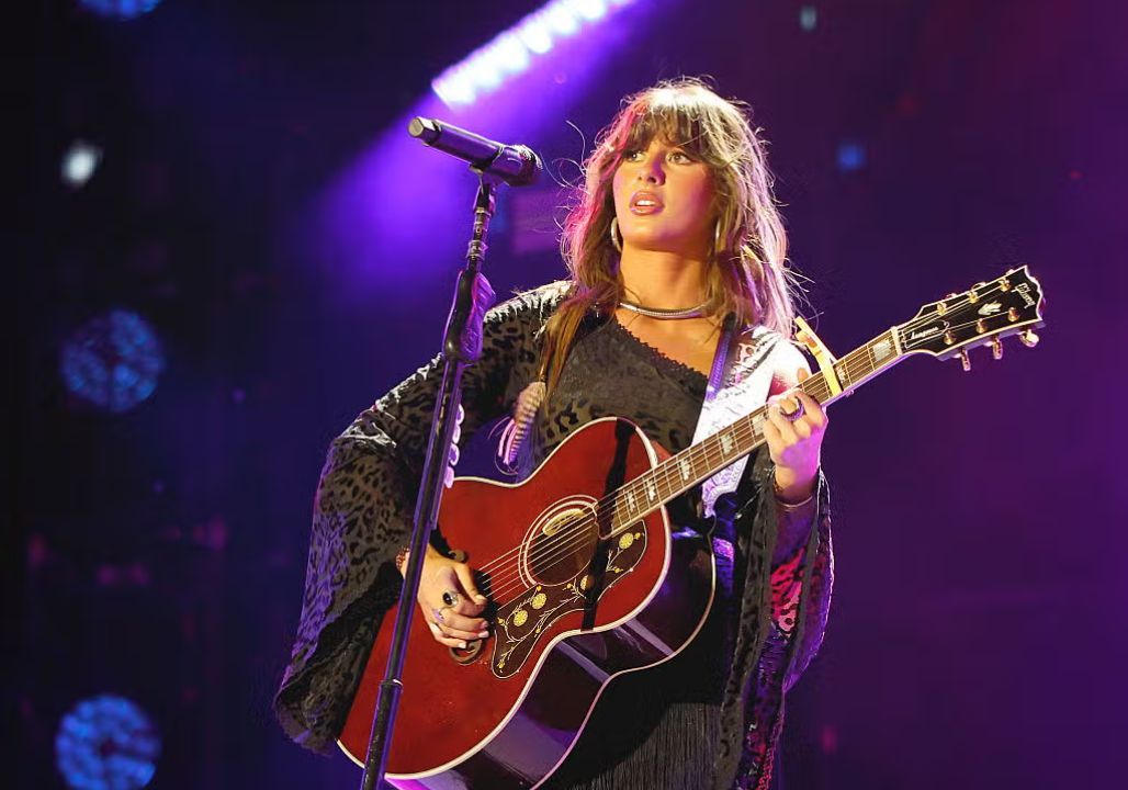 At 26, Ella Langley has already begun to come full circle — stepping back from the relentless pace of breakout hits, crowded tour buses, and the glare of viral fame to reconnect with the quieter place where her songwriting was born. Away from the noise, the rising country voice now greets slower mornings, familiar Southern roads, and moments of stillness that ground her creativity, trading constant momentum for intention.