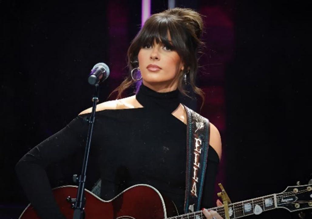 “ELLA LANGLEY’S NEWEST SONG FEELS LIKE A CRY FOR A WEARY SOUL! After a sudden mental and emotional breakdown forced her to cancel everything, she experienced an unexpected miracle during an ordinary Uber ride. Many are now asking: why didn’t this rising star turn to Hollywood specialists or luxury retreats for help? That answer is stirring intense conversation across the country music world right now. Instead of chasing the spotlight, she hurried back to her mother’s porch in Alabama, searching for a voice from her past that could steady her again. Her new hit, “Loving Life Again,” has already broken records, reaching 1.2 million views in just 24 hours. Whether you are already a fan or simply someone battling your own dark clouds, this powerful story of faith may be exactly what your heart needs.”